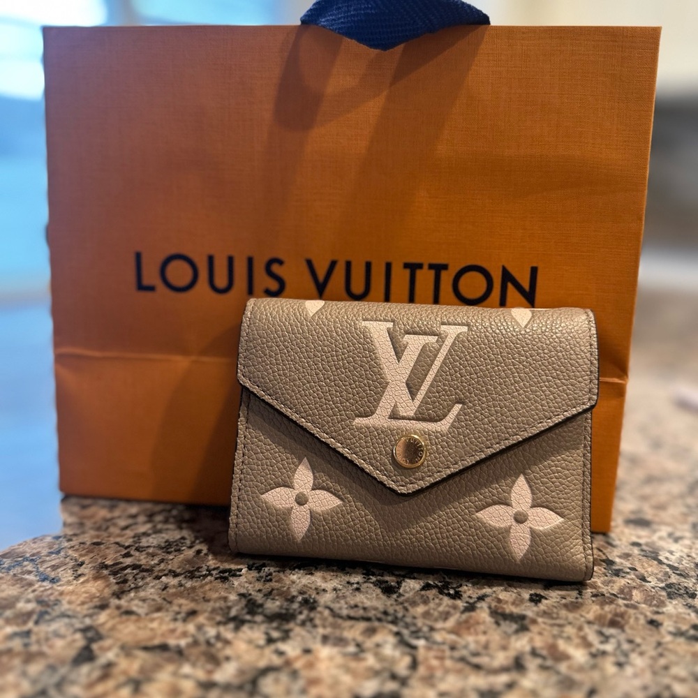 Louis Vuitton monogram empreinte leather victorine wallet